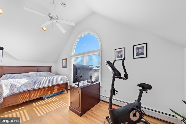 bedroom with lofted ceiling, a baseboard radiator, light wood-type flooring, and ceiling fan