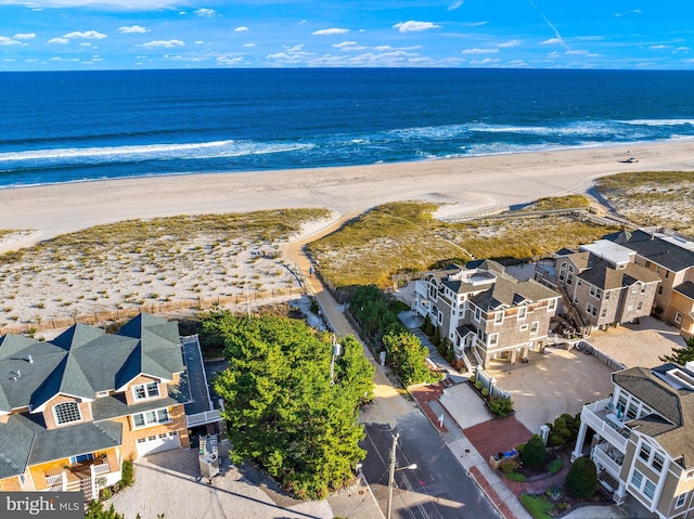 aerial view featuring a water view and a view of the beach