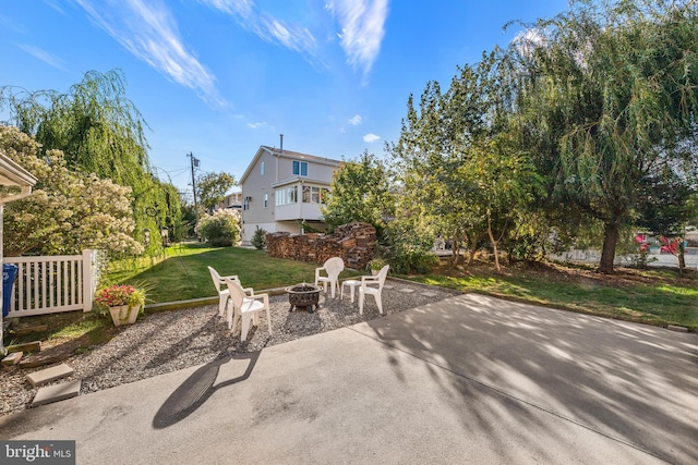 view of patio / terrace featuring a fire pit