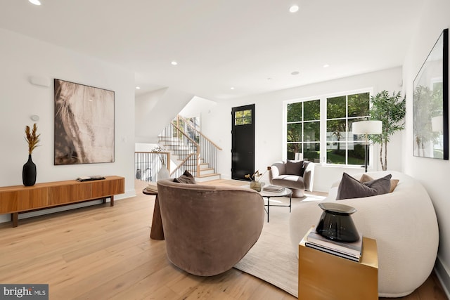 living room with light hardwood / wood-style floors