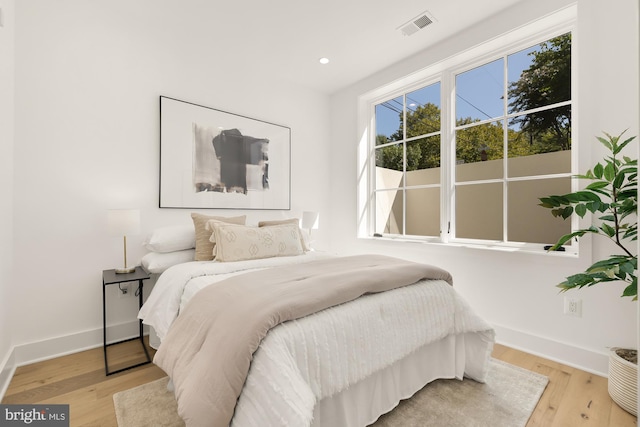 bedroom featuring light hardwood / wood-style flooring