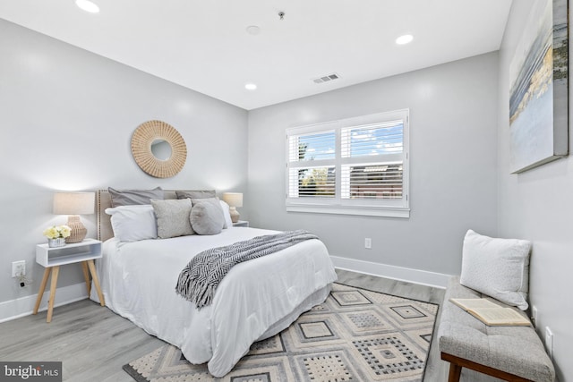 bedroom featuring light hardwood / wood-style floors