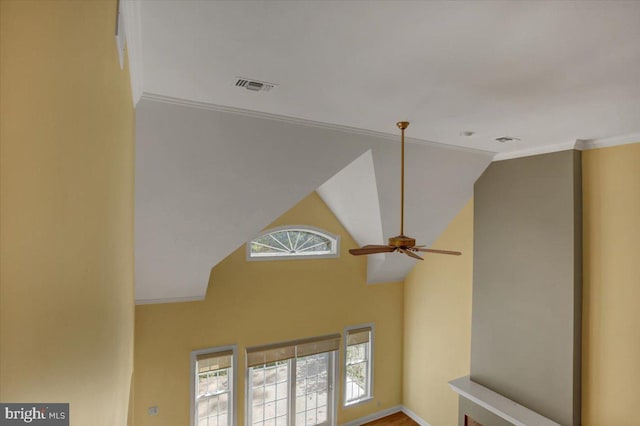 room details featuring crown molding and ceiling fan