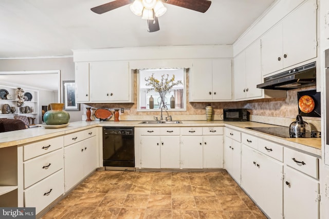 kitchen with sink, black appliances, and white cabinetry