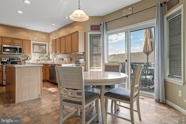 dining space with sink