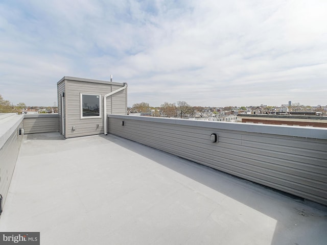 view of patio with a balcony