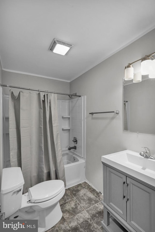 full bathroom with shower / bath combo, vanity, and toilet