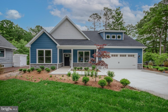 1 Tiller Ln, Ocean Pines, MD 21811 - craftsman house featuring stone siding, an attached garage, concrete driveway, a porch, and a shingled roof