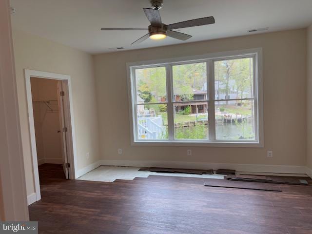1 Tiller Ln, Ocean Pines, MD 21811 - unfurnished room with wood finished floors, a ceiling fan, and baseboards