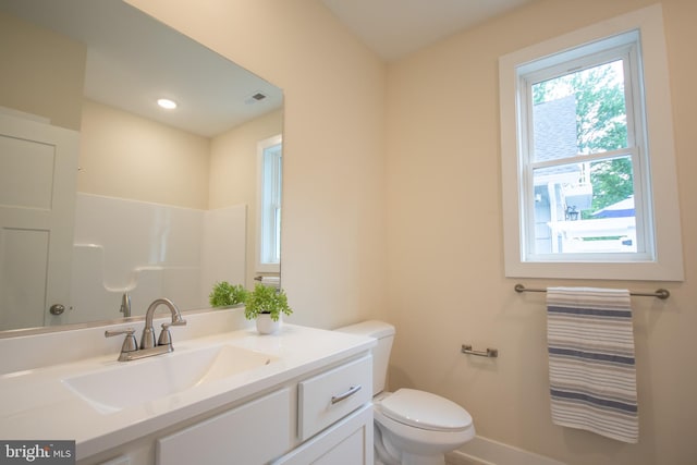 1 Tiller Ln, Ocean Pines, MD 21811 - bathroom with toilet, baseboards, and vanity