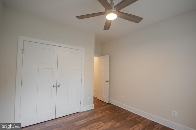 1 Tiller Ln, Ocean Pines, MD 21811 - unfurnished bedroom with dark wood-style flooring, baseboards, a closet, and ceiling fan