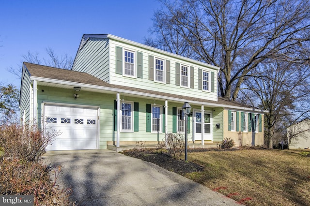 view of front of house with a porch and a garage