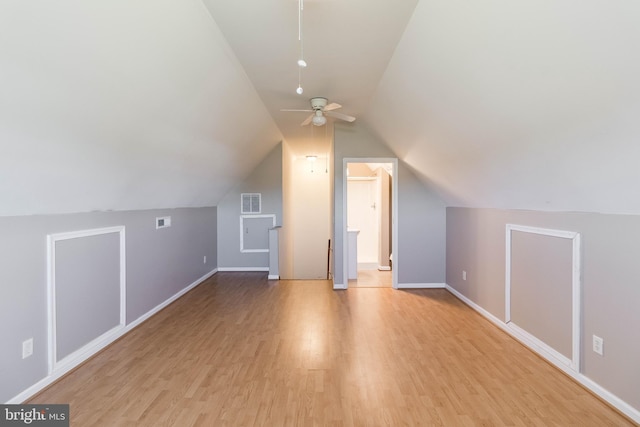 bonus room featuring ceiling fan, vaulted ceiling, and light hardwood / wood-style floors