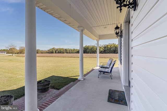 view of patio featuring a porch