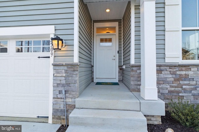 property entrance featuring a garage