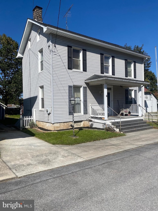 view of front of home featuring covered porch