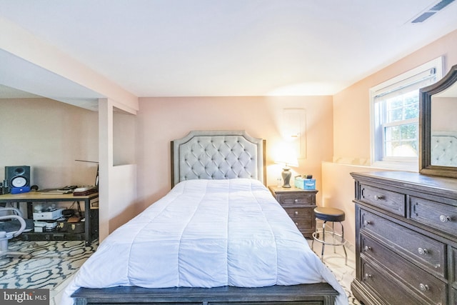 bedroom with visible vents