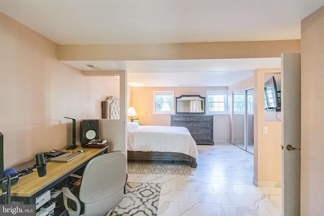 bedroom with marble finish floor