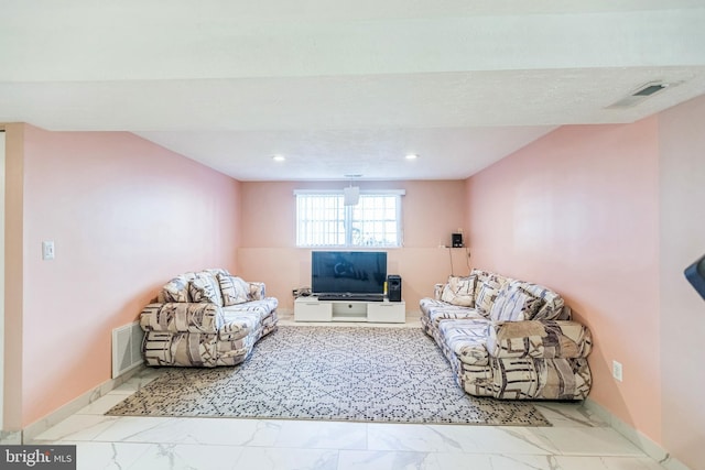 living room with baseboards, visible vents, recessed lighting, and marble finish floor
