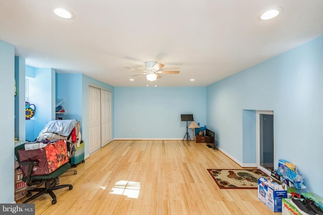rec room featuring baseboards, a ceiling fan, wood finished floors, and recessed lighting