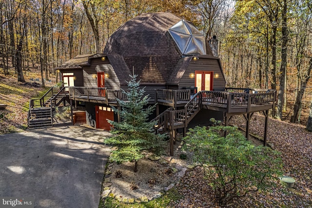 621 Paradise Hts, Oakland, MD 21550 - view of front of house featuring a wooden deck, stairway, a shingled roof, and driveway