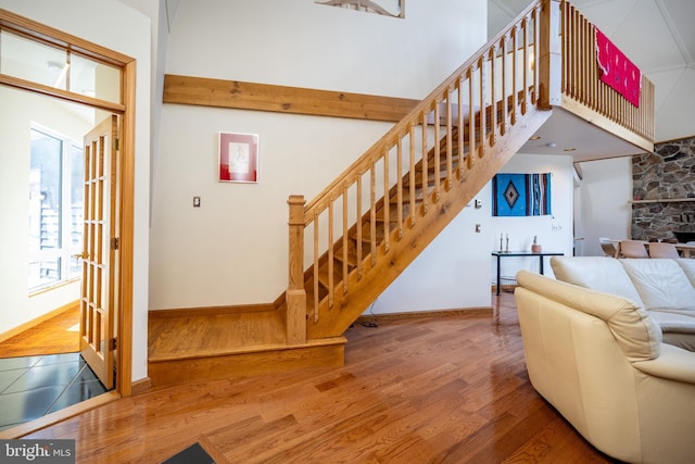 621 Paradise Hts, Oakland, MD 21550 - living room featuring baseboards, stairway, and wood finished floors
