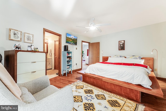 bedroom featuring light hardwood / wood-style flooring and ceiling fan