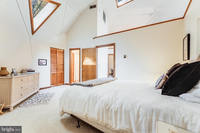 bedroom featuring light carpet and high vaulted ceiling