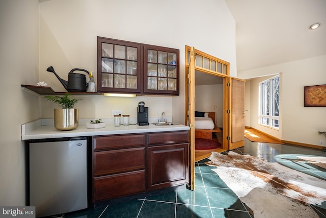 621 Paradise Hts, Oakland, MD 21550 - bar with fridge, a sink, high vaulted ceiling, and dark tile patterned flooring