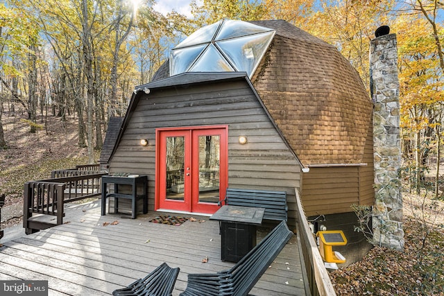 wooden deck featuring french doors