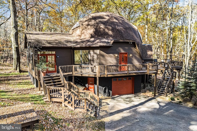 view of front of house featuring a wooden deck