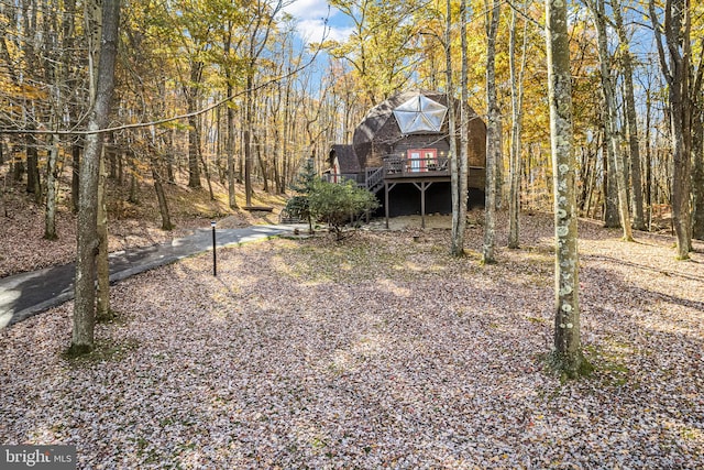 view of yard featuring a deck