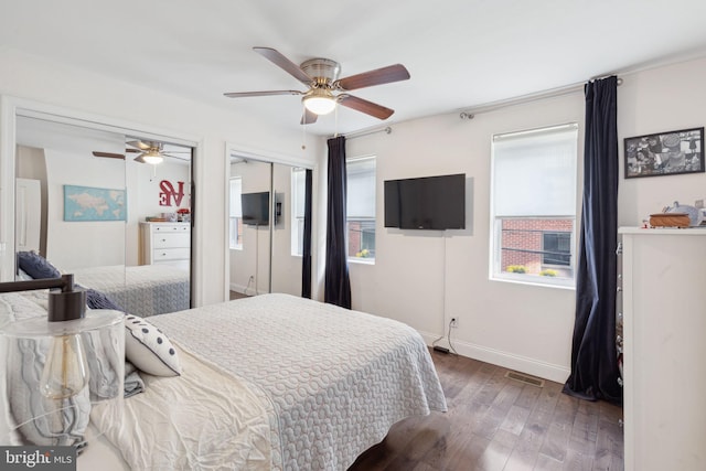 bedroom featuring dark hardwood / wood-style flooring and ceiling fan