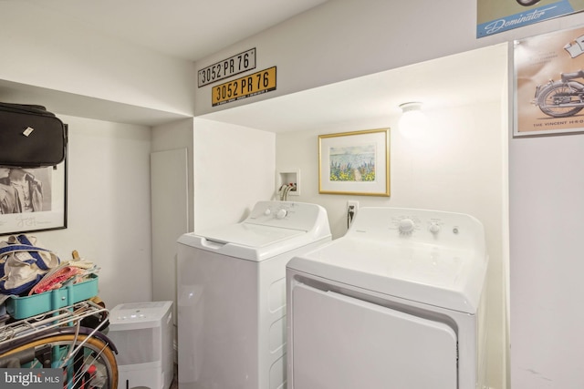 laundry room with washer and dryer