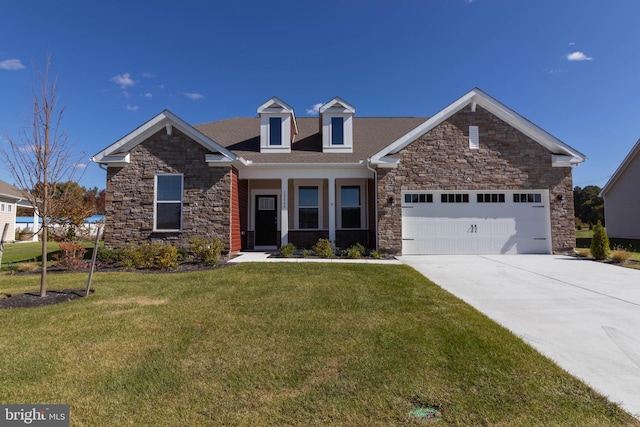 view of front facade featuring a garage and a front lawn