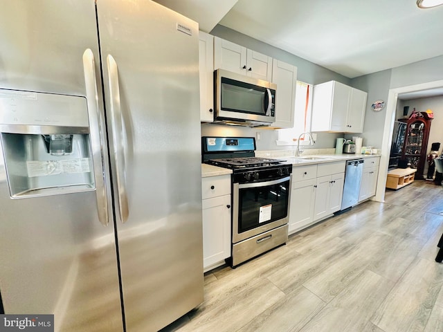 kitchen with white cabinets and stainless steel appliances