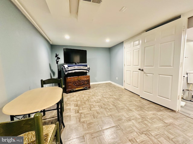 living area with light parquet flooring