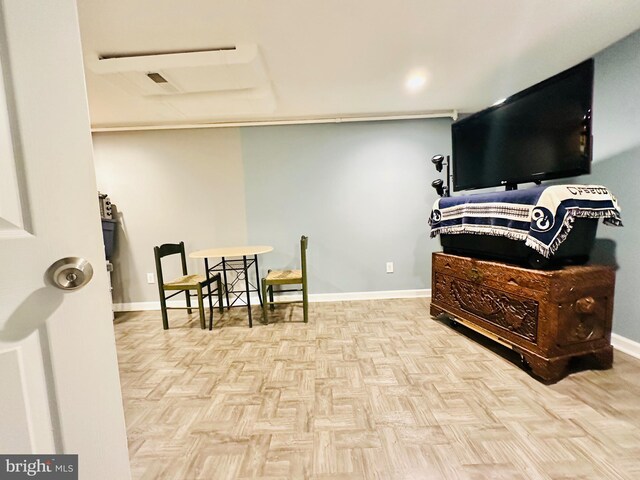 living area with light parquet floors