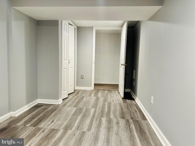 unfurnished bedroom featuring light hardwood / wood-style floors