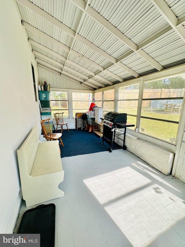 sunroom with lofted ceiling