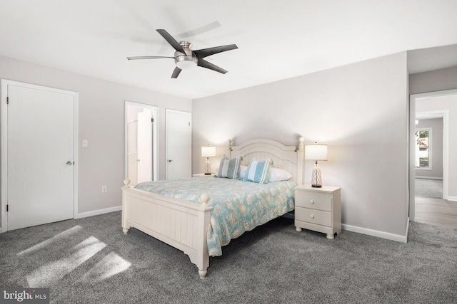 bedroom with ceiling fan and dark carpet