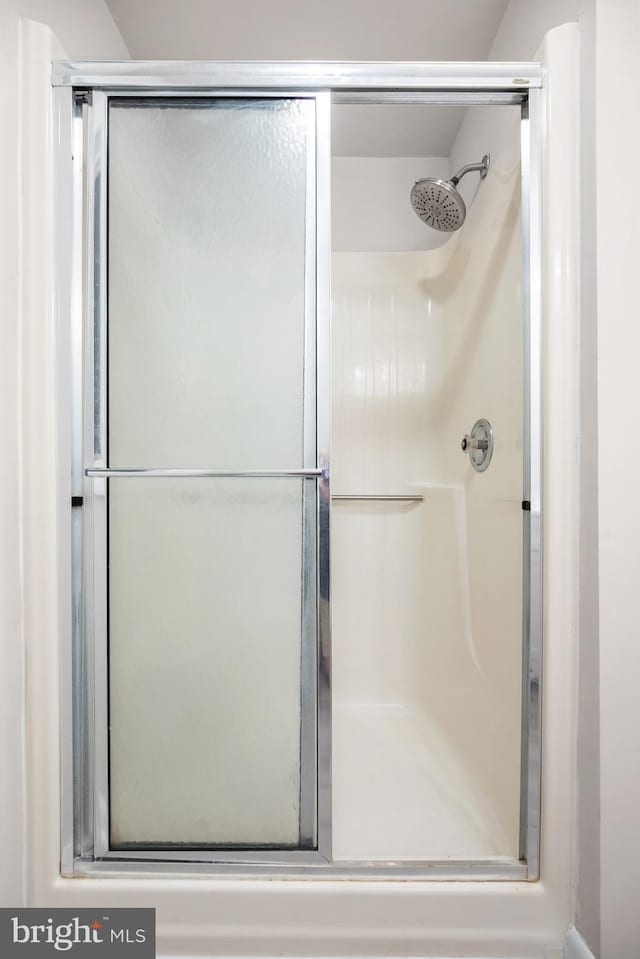 bathroom with an enclosed shower