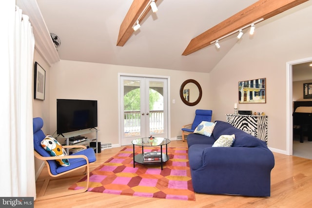 living room with wood-type flooring, vaulted ceiling with beams, french doors, and rail lighting