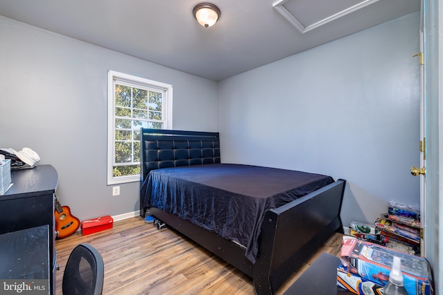 bedroom featuring light wood-type flooring