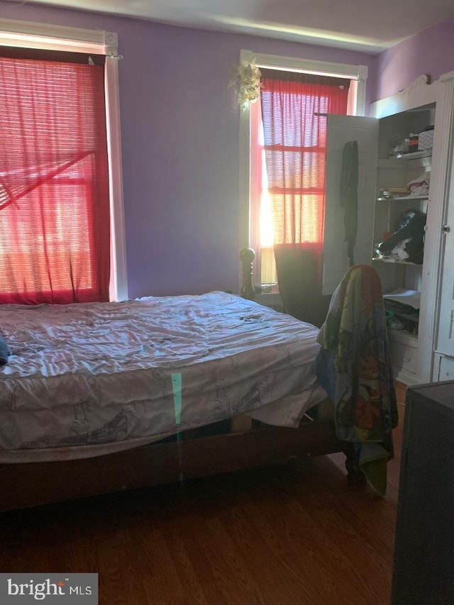 bedroom featuring hardwood / wood-style flooring