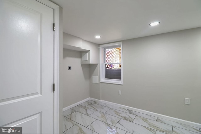 laundry room with laundry area, electric dryer hookup, recessed lighting, marble finish floor, and baseboards