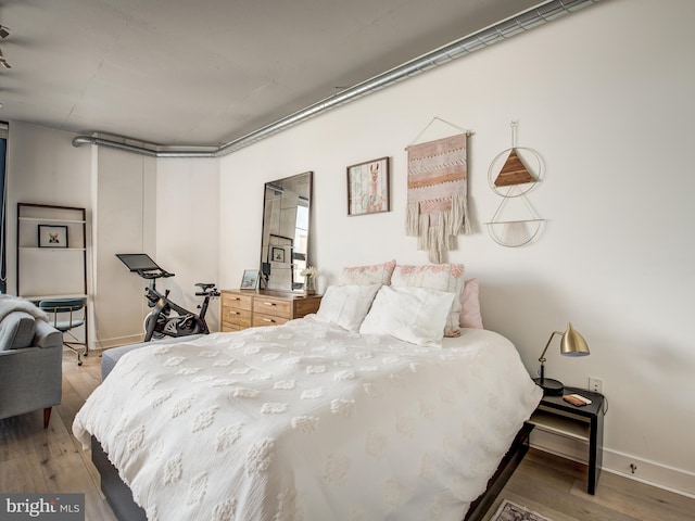 bedroom featuring hardwood / wood-style flooring