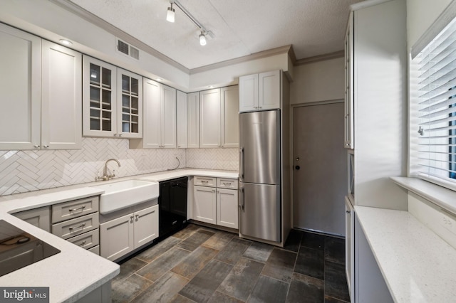 kitchen with sink, stainless steel refrigerator, stovetop, dishwasher, and crown molding