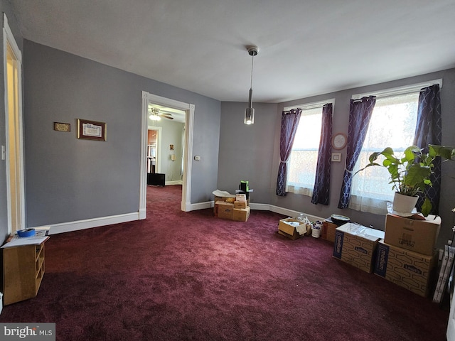 interior space with dark colored carpet