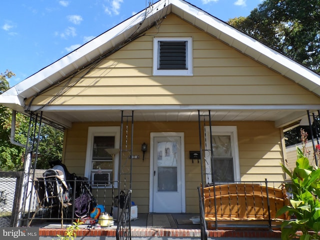 bungalow-style home featuring covered porch